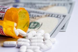 Opioid pills and money