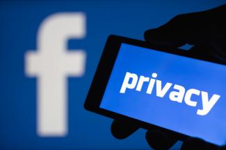 Facebook logo with word privacy