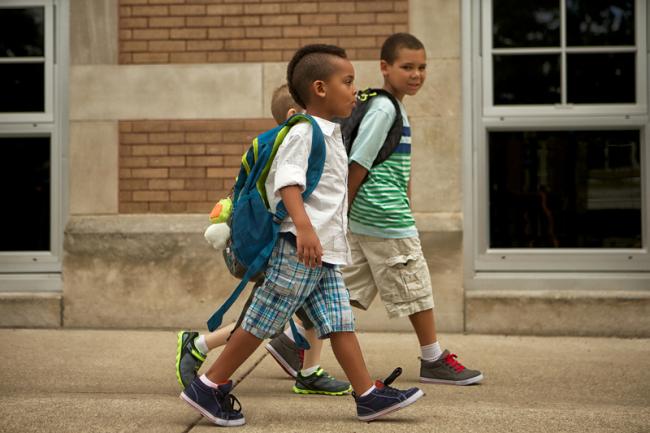 Young students walking to school